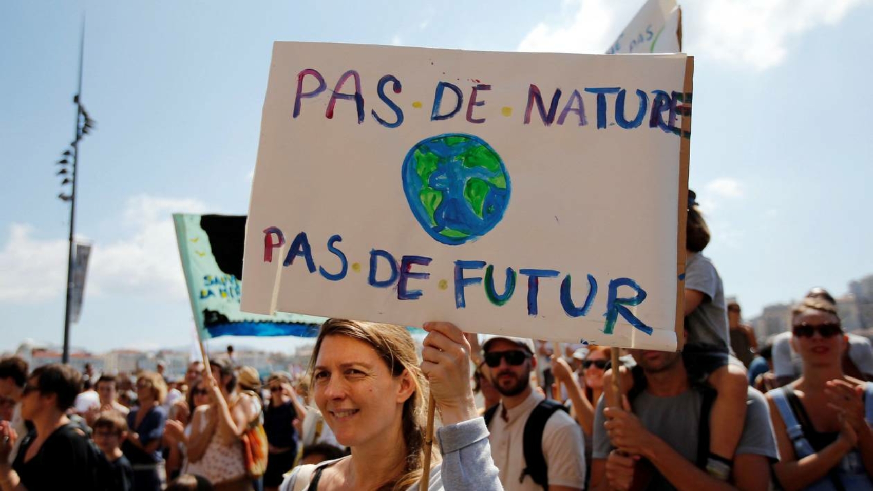 Environmental activists gather to urge world leaders to take action against climate change in Marseille, France,  September 8, 2018. The placard reads "No nature, no future".   REUTERS/Jean-Paul Pelissier