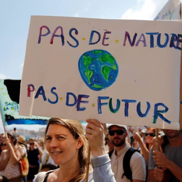 Environmental activists gather to urge world leaders to take action against climate change in Marseille, France,  September 8, 2018. The placard reads "No nature, no future".   REUTERS/Jean-Paul Pelissier